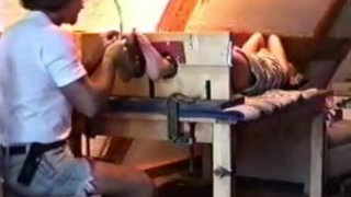 A merciless feet tickle inflicted on a red head young lady