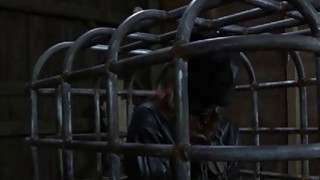 Caged babe to give blowjob